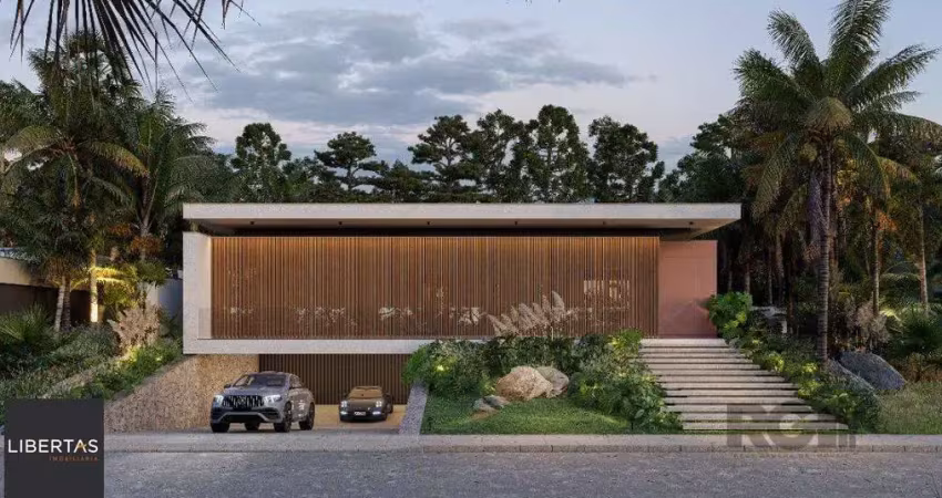 A casa conta com 434m2 de área construída, mas com um aproveitamento total dos 1.012m2 do lote