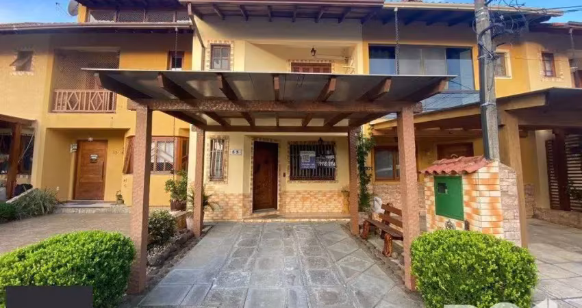 Casa com 3 quartos à venda na Avenida Edgar Pires de Castro, 1286, Hípica, Porto Alegre