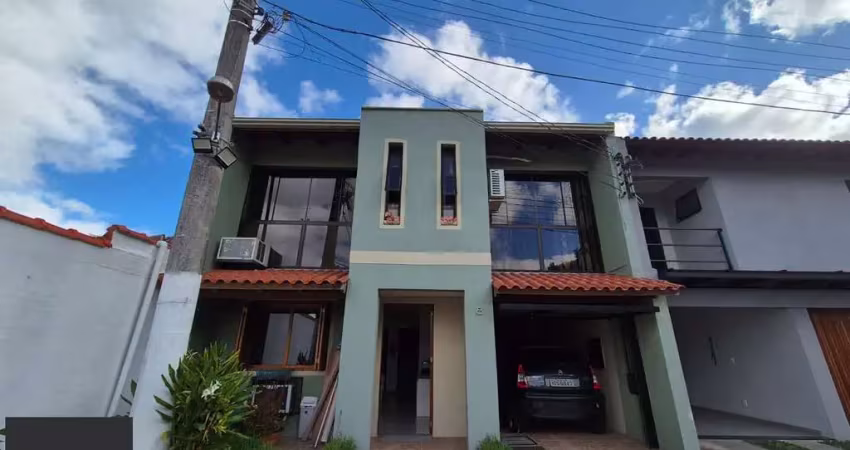 Casa em condomínio fechado com 3 quartos à venda na Avenida da Cavalhada, 6445, Cavalhada, Porto Alegre