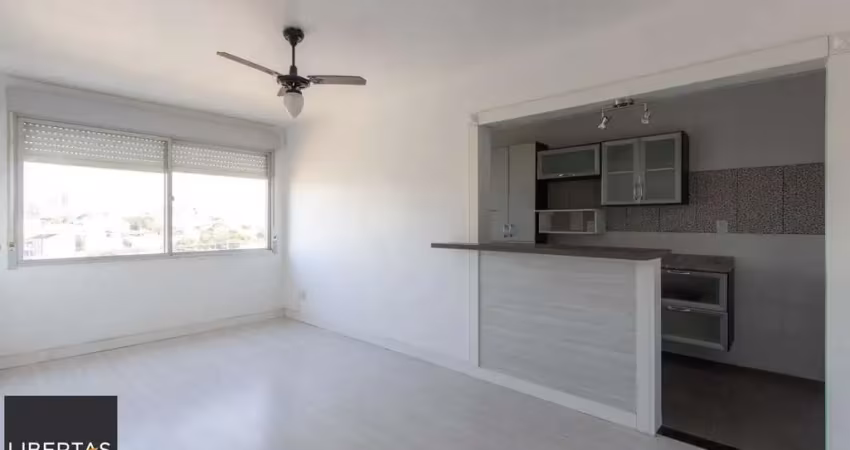 Apartamento semimobiliado à venda no bairro cristal, 2 dormitórios, 2 banheiros, 1 vaga coberta e vista livre para o guaíba