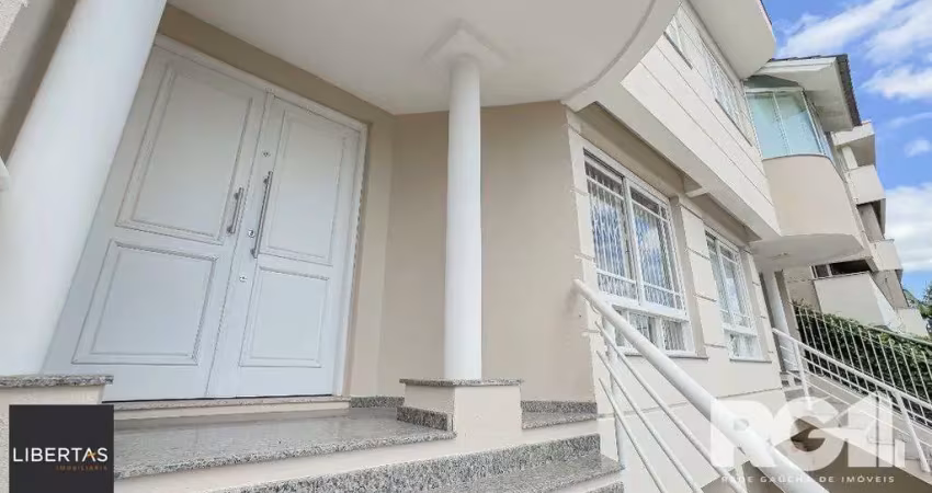 Casa com 4 quartos à venda na Rua Doutor Barbosa Gonçalves, 219, Chácara das Pedras, Porto Alegre