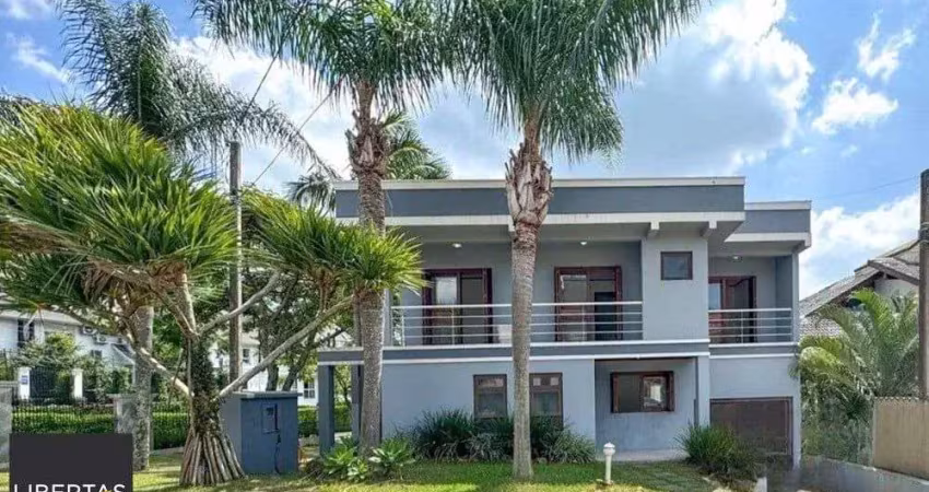 Casa com 4 quartos à venda na Rua Tocantins, 937, Lomba do Pinheiro, Porto Alegre