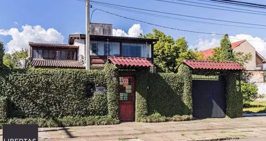Casa com 3 quartos à venda na Avenida Guarujá, 140, Guarujá, Porto Alegre
