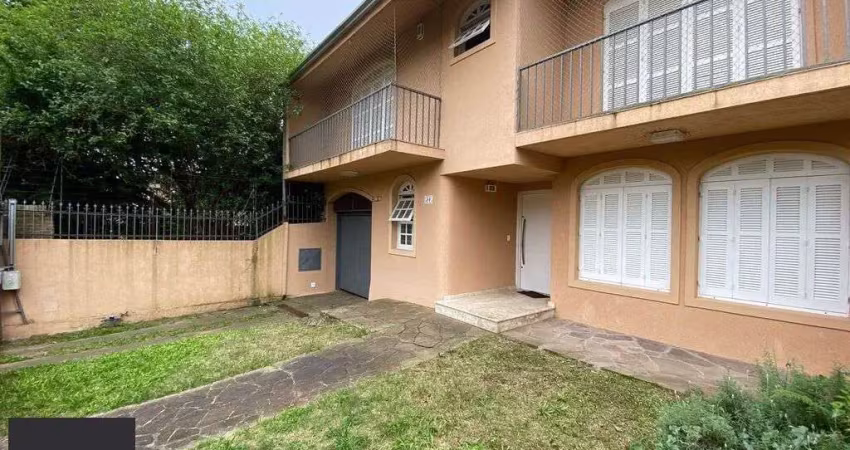 Casa com 4 quartos à venda na Rua Licínio Cardoso, 26, Chácara das Pedras, Porto Alegre