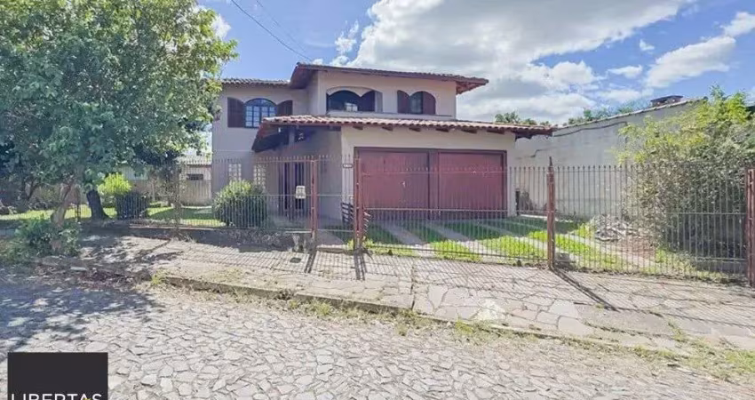 Casa com 5 quartos à venda na Rua Vicente Celestino, 430, Parque Dos Maias, Porto Alegre