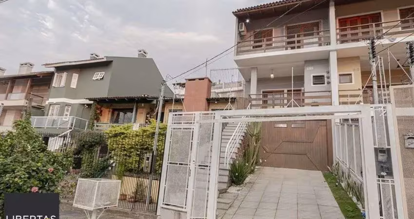 Casa com 3 quartos à venda na Avenida Doutor Francisco Roberto Dall Igna, 308, Espírito Santo, Porto Alegre