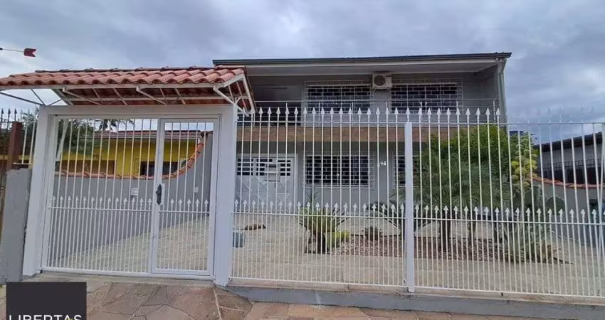 Casa com 3 quartos à venda na Rua Gaspar Martins, 894, Americana, Alvorada