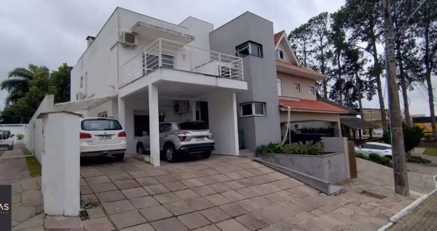 Casa em condomínio fechado com 3 quartos à venda na Avenida Edgar Pires de Castro, 540, Hípica, Porto Alegre