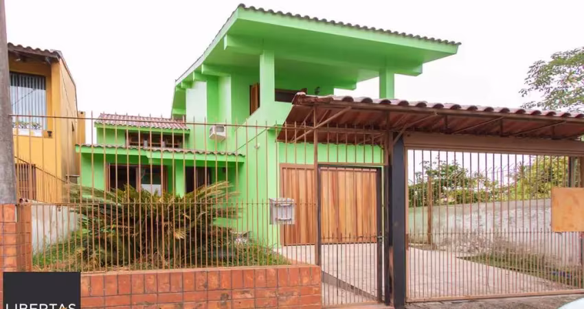 Casa com 3 quartos à venda na Rua Augusto de Lourenço Martins, 110, Vila Nova, Porto Alegre