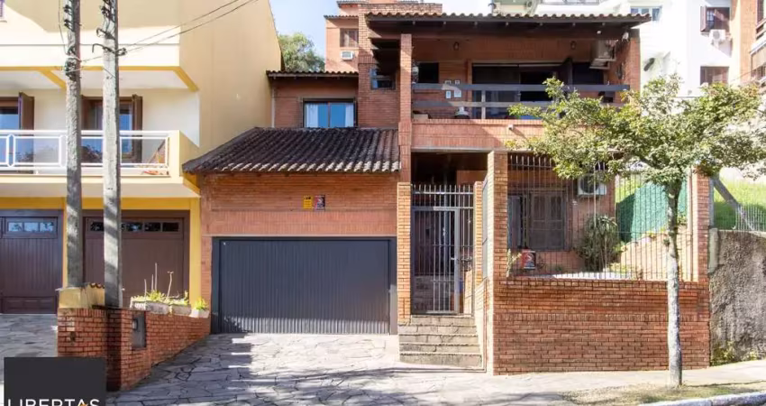 Casa com 5 quartos à venda na Rua Fernando Osório, 590, Teresópolis, Porto Alegre