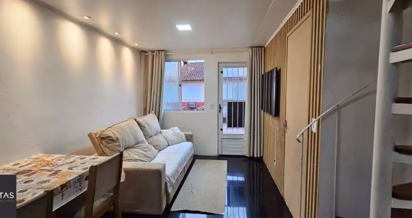 Casa em condomínio com 02 dormitórios com garagem no bairro parque santa  fé