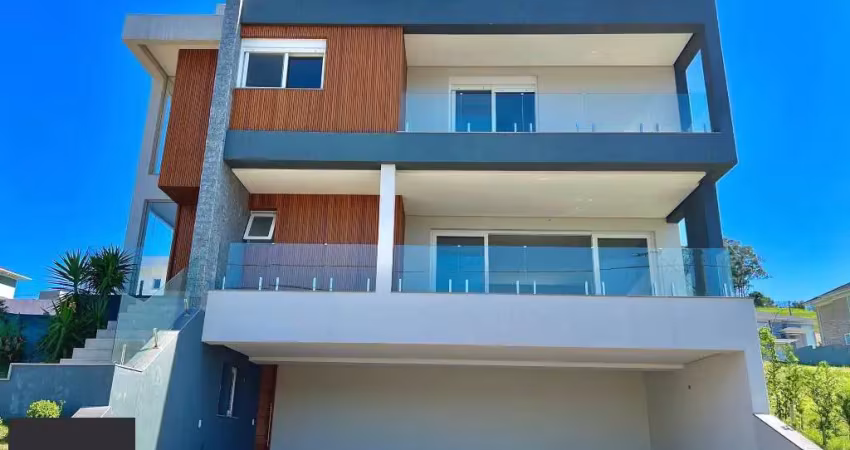 Casa em condomínio fechado com 4 quartos à venda na Estrada das Três Meninas, 387, Vila Nova, Porto Alegre