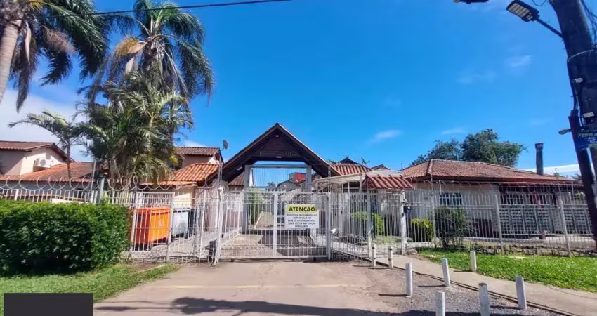 Casa com 2 quartos à venda na Avenida João Ferreira Jardim, 968, Parque Santa Fé, Porto Alegre