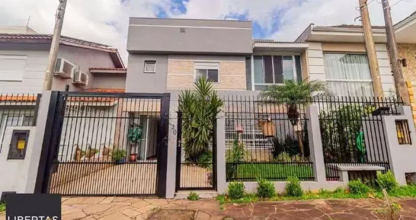 Casa em condomínio fechado com 3 quartos à venda na Rua Ronaldo Molina de Quadros, 320, Mário Quintana, Porto Alegre