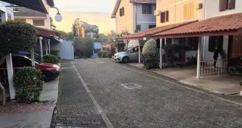 Casa com 2 dormitórios, 1 vaga, na av. otto niemeyer, bairro camaquã, poa, rs