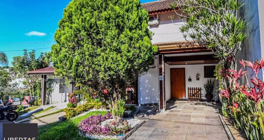 Casa em condomínio fechado com 3 quartos à venda na Avenida Eduardo Prado, 695, Cavalhada, Porto Alegre