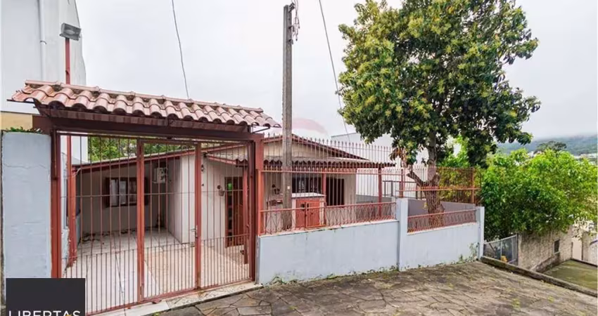 Casa com 3 quartos à venda na Rua Cunha Neto, 334, Nonoai, Porto Alegre