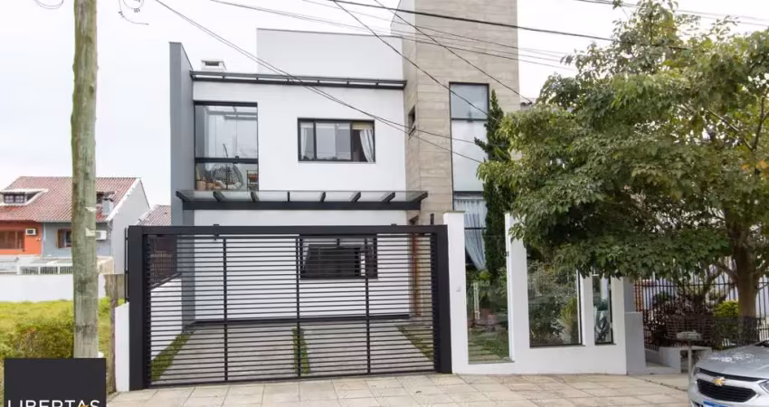 Excelente casa de alvenaria, 4 dormitórios, 2 suítes e 2 vagas de garagem.
