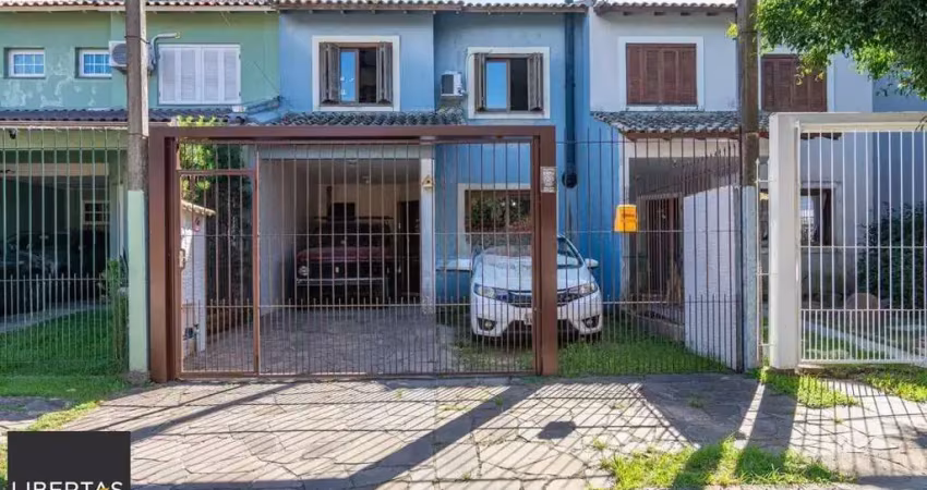 Casa com 3 quartos à venda na Rua Rodolpho Espinoza, 47, Hípica, Porto Alegre
