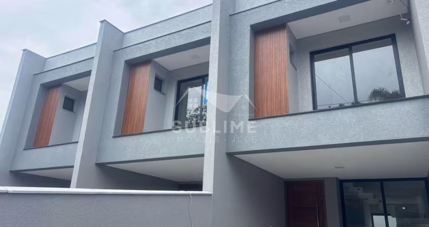 Sobrado Geminado no Bairro Costa e Silva com Suíte