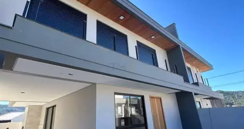 Casa com 3 quartos à venda na Travessa Osny Ubaldo Correia, 3499, Forquilhas, São José