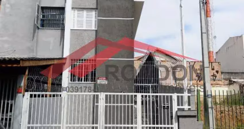Sobrado para fins comerciais com 4 dormitórios, 2 banheiros, 2 vagas