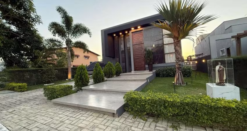 Casa com 3 suítes, área gourmet e piscina aquecida no condomínio Caminhos da Serra em Bananeiras