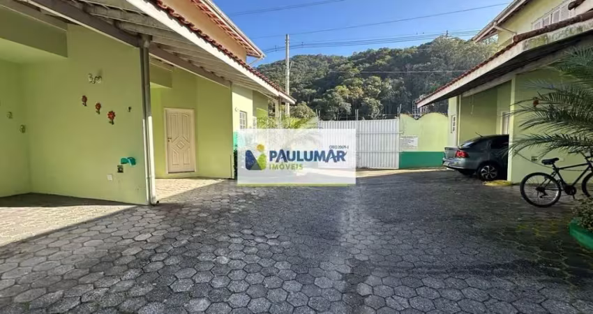 Sobrado em condominio fechado no centro de mongaguá