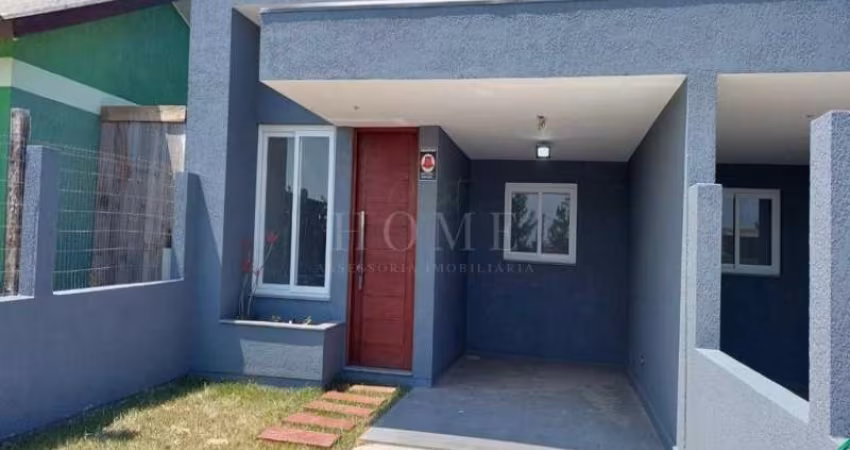 CASA GEMINADA COM COM 2 DORM SENDO 1 SUITE