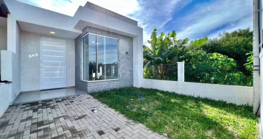CASA COM 2 DORMITORIOS, SENDO 1 SUITE BEM LOCALIZADO!