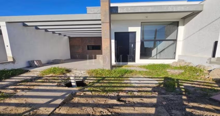 CASA COM 2 DORMITÓRIOS, SENDO 1 SUITE BEM LOCALIZADA!