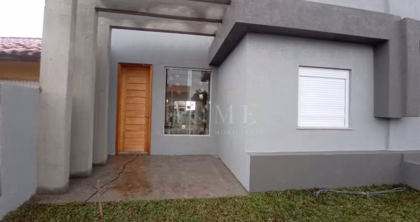 CASA COM 2 DORMITORIOS, SENDO 1 SUITE BEM LOCALIZADA!