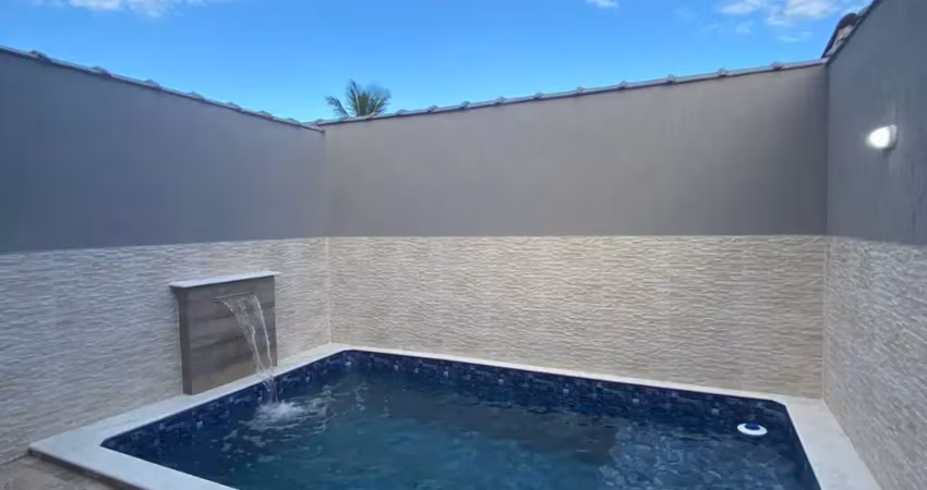 Casa com piscina e área gourmet com churrasqueira em Itanhaém.