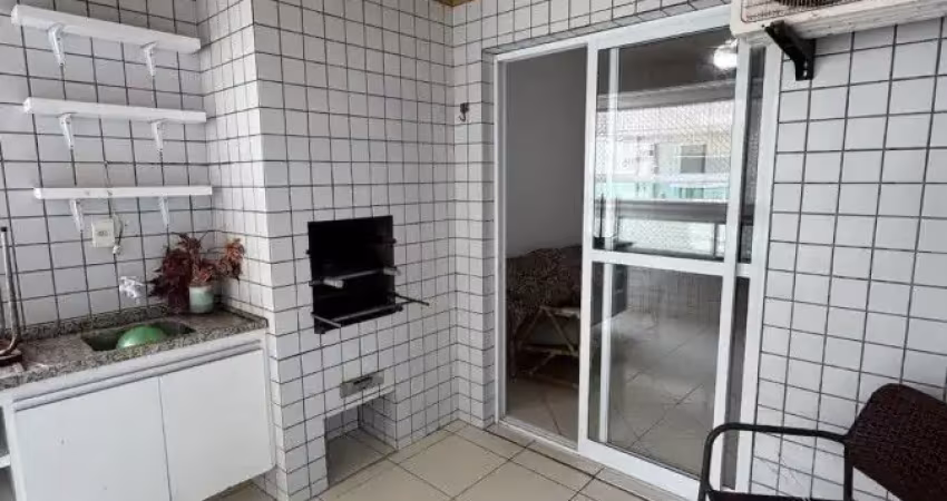 Apartamento à 150m do mar com piscina e área gourmet em praia grande.
