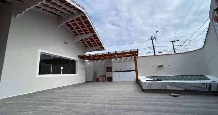 Casa com 3 dormitórios à venda, 211 m² por R$ 810.000 - Caiçara - Praia Grande/SP