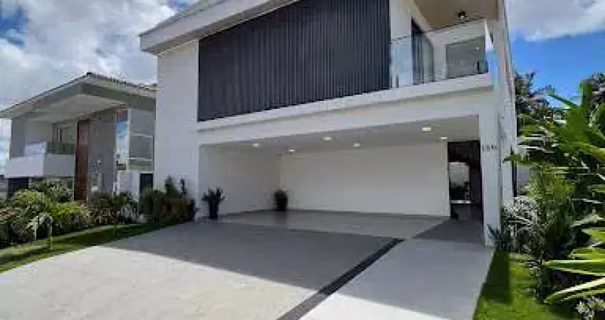 Casa de 310m2 com 5 suítes e lazer privativa, em condomínio fechado