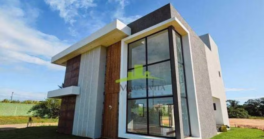 Casa à venda em Guarajuba: 4 suítes, piscina com hidromassagem, área gourmet, nascente total, 192m² de área construída. Condomínio Canto de Guarajuba.