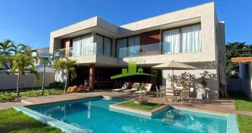 Casa à venda no Condomínio Paraíso, Guarajuba, 303m², 7 suítes, piscina, área gourmet, a 20m da praia, Porteira Fechada. Agende sua visita!