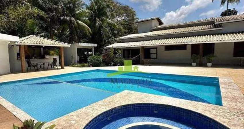 Casa à venda em condomínio Lauro de Freitas: 430m², 6 quartos, 4 suítes, piscina, área gourmet, área verde, segurança 24h, próxima à Estrada do Coco