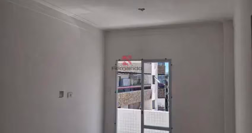 Apartamento novo com sacada e vista parcial do mar no bairro tupi