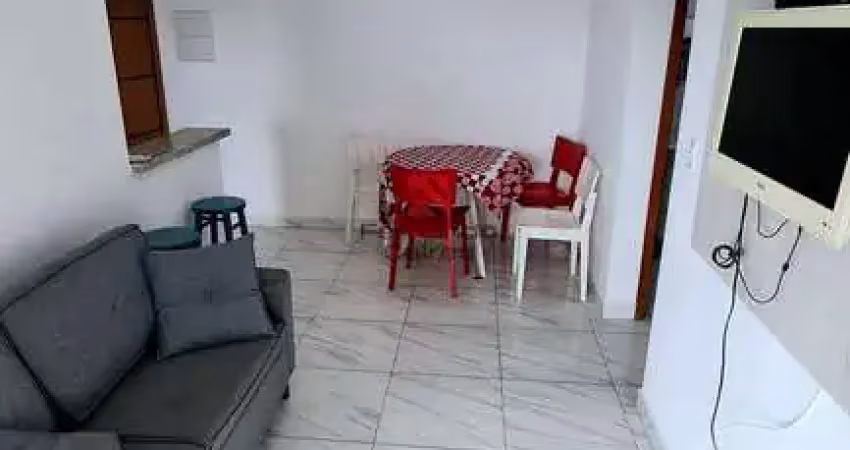 Apartamento 1 dormitório com varanda envidraçada e vista mar parcial na mirim