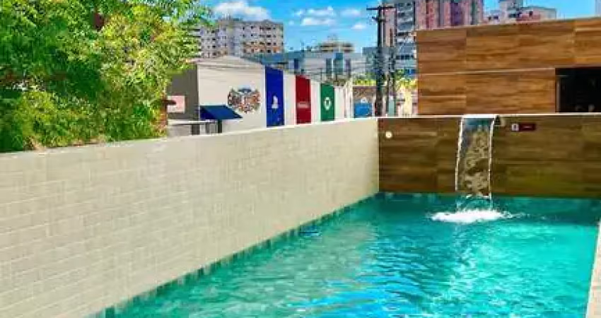 Apartamento novo com 2 quartos a poucos passos da praia 