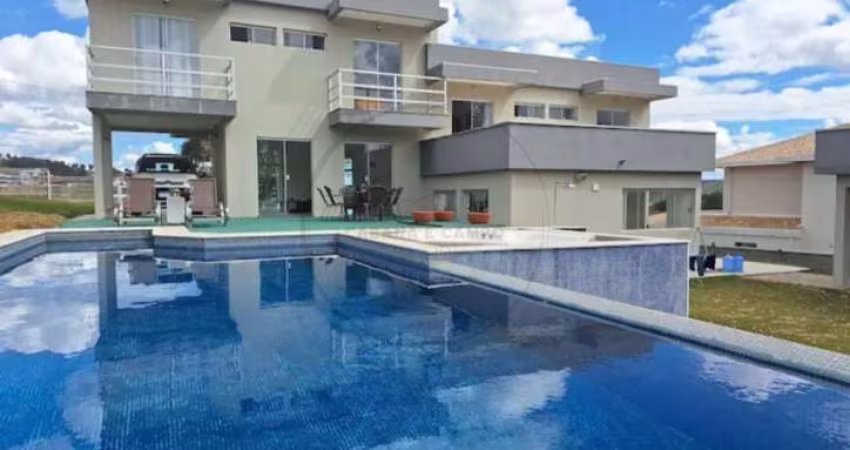 Imperdível! Casa de luxo em condomínio de Vargem-SP, 4 quartos, 4 suítes, 3 salas, 7 banheiros e 2 vagas de garagem!