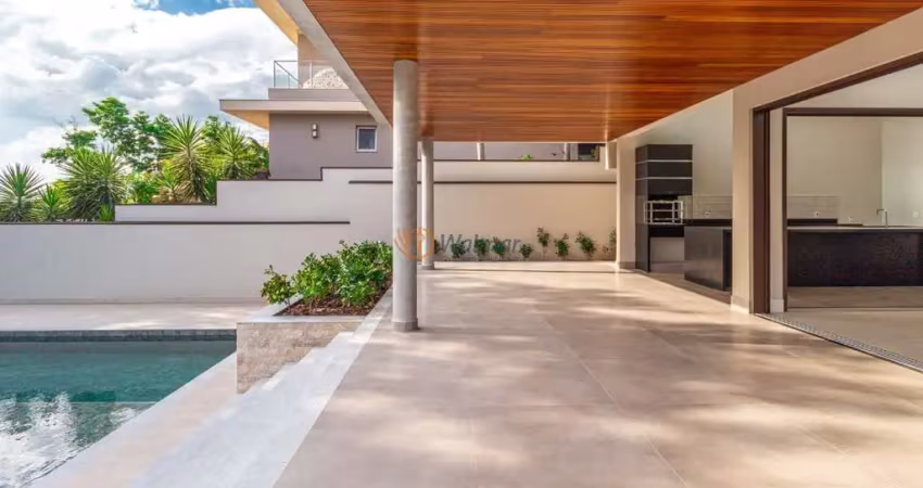 Imponente residência em condomínio de luxo em Campinas-SP, com 4 suítes e 6 vagas de garagem, 700m² de área. Confira!