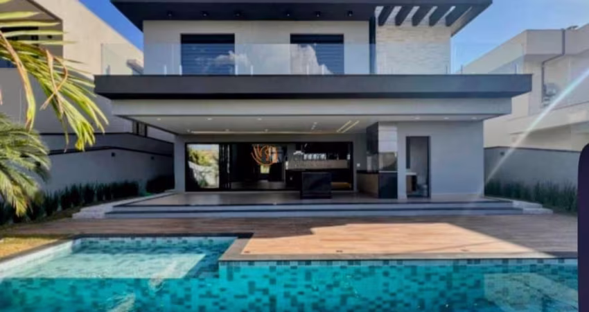 Casa de alto padrão em Alphaville Dom Pedro - Campinas-SP: 5 quartos, 5 suítes, 3 salas, 7 banheiros, 4 vagas, 440m² de área.