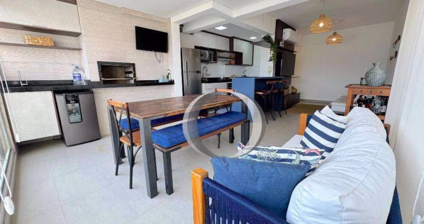 Apartamento com vista para o mar, varanda gourmet, 2 quartos (sendo 1 suíte), 2 vagas à venda, 71 m² por R$ 660.000 - Enseada - Guarujá/SP