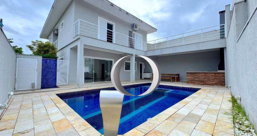 Casa em condomínio com piscina, espaço gourmet, 4 suítes à venda, 300 m² por R$ 1.600.000 - Jardim Albamar - Guarujá/SP