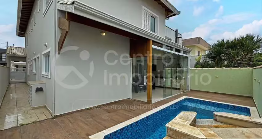 Casa à venda com piscina e 4 quartos em peruíbe, no bairro jd tres marias