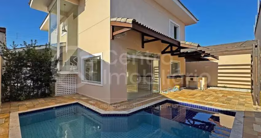 Casa à venda com piscina e 4 quartos em peruíbe, no bairro parque turistico