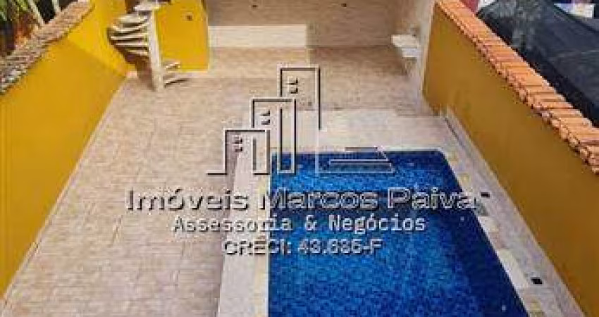 Casa com piscina lado praia.